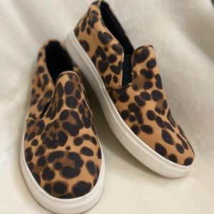 Leopard print sneakers.